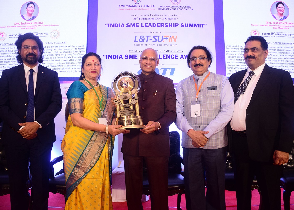 Smt. Sushama Chordiya, Founder, Suryadatta Women Entrepreneurship and Leadership Academy, Pune has been conferred with the prestigious “PRIDE OF MAHARASHTRA AWARD” for her Exemplary Contribution Towards Social Entrepreneurship for Self-Reliant India, initiated by Maharashtra Industry Development Association at the hands of Shri Ramesh Bais, Hon’ble Governor of Maharashtra on 25th March 2023, in picture (left to right), Shri Charles D’Costa, Chief Transformation Officer, GATI, Shri Chandrakant Salunkhe, Founder & President, Maharashtra Industry & Development Association & SME Chamber of India.